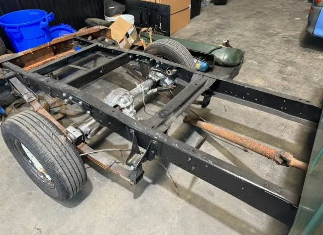 Our Project ’72 frame after the flip: the rear axle now sits on top of the leaf spring pack — the same truck, roughly five inches lower out back